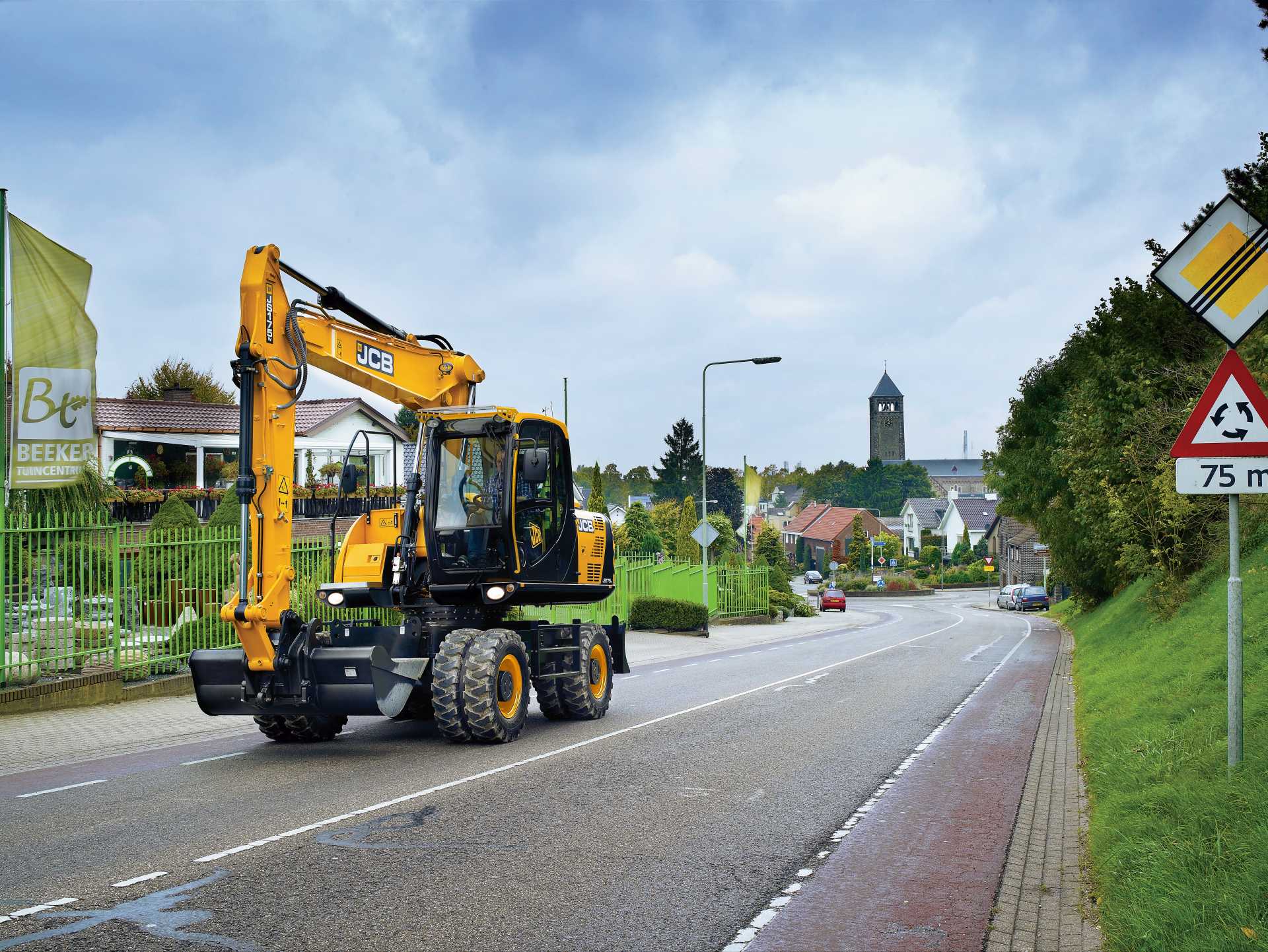 Koparka kołowa JS145W w trakcie pracy